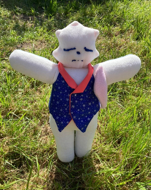 Humanoid star figure with vest