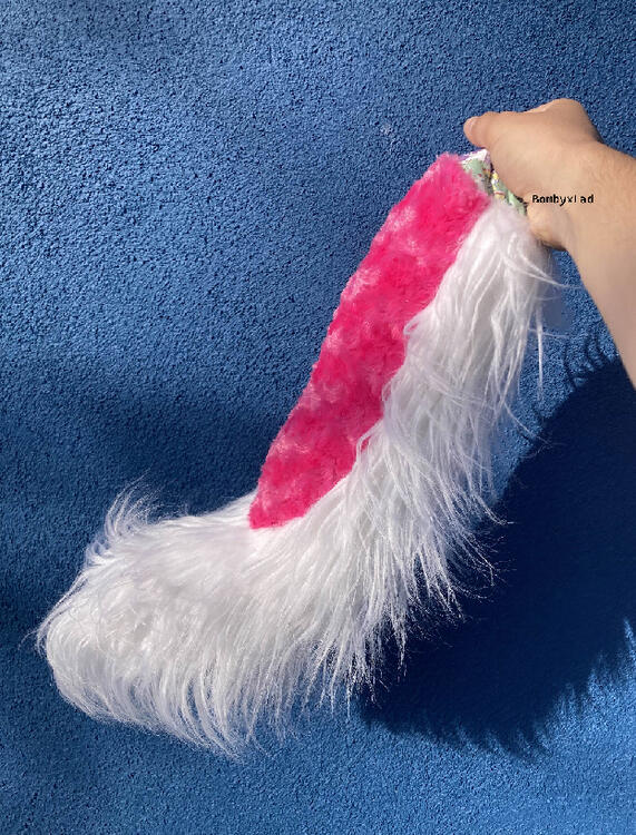 pink tail with white undercoat